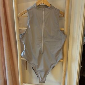 Skims recycled swim sleeveless one piece.